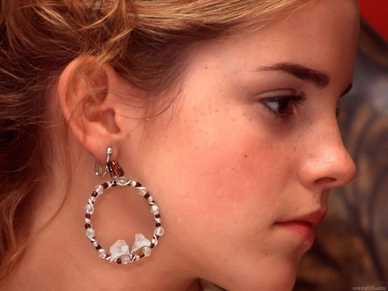 woman with beaded hoop earrings
