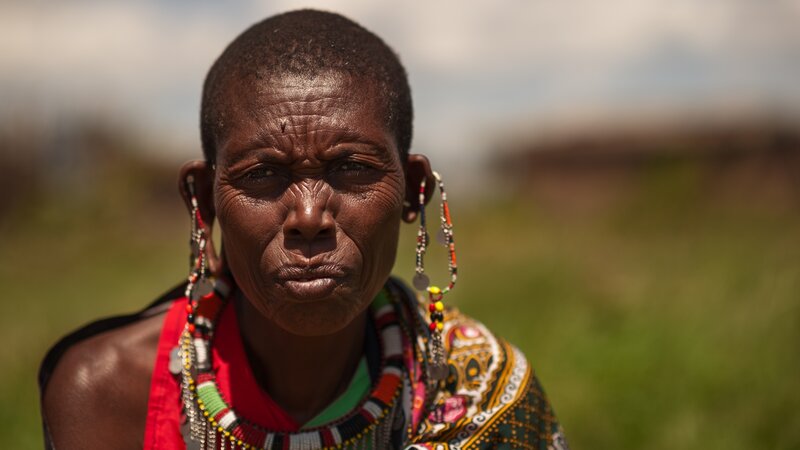 Woman with Beaded Jewelry — Green