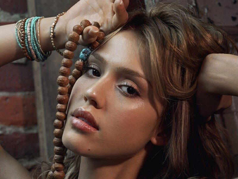 woman with beaded necklace