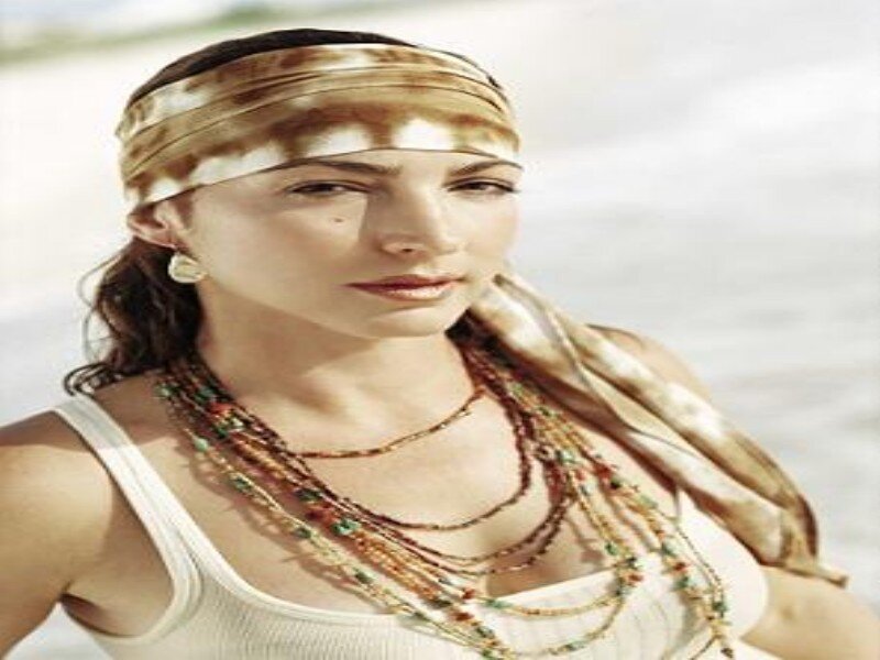 Woman with Beaded Necklaces — Beige