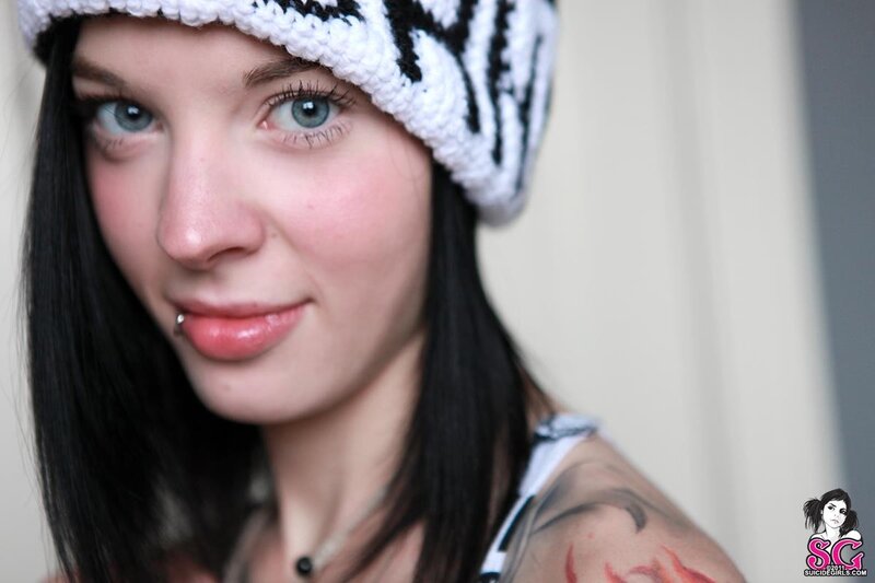 woman with beanie and tattoo