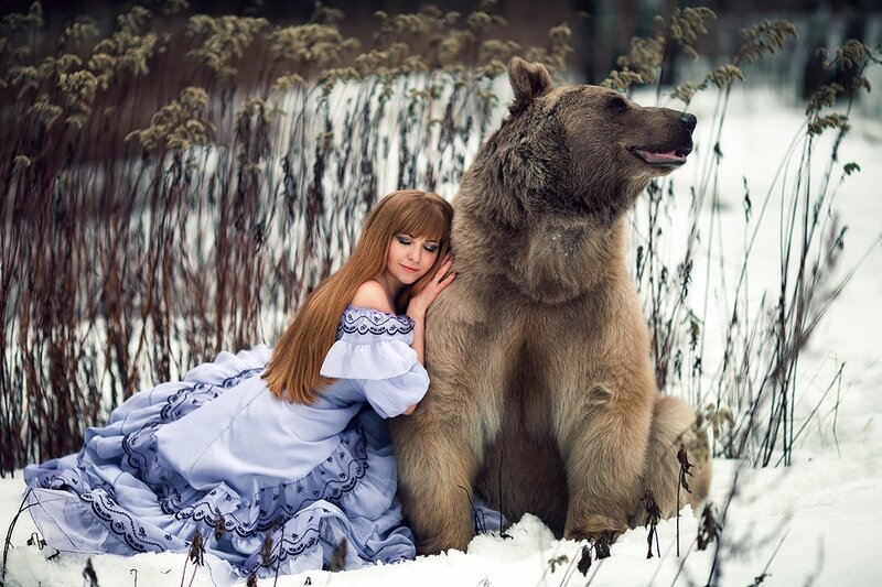 Woman with Bear in Snow
