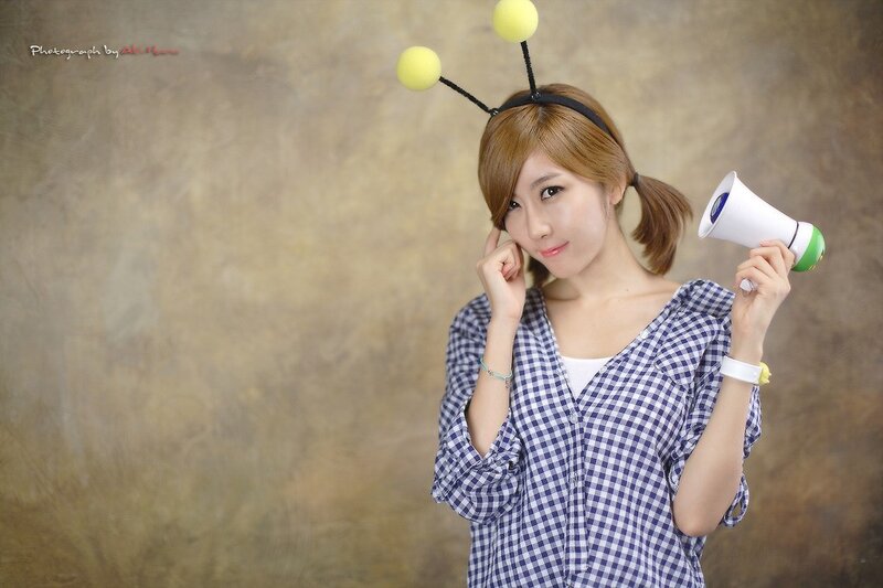 Woman with bee antennae and megaphone