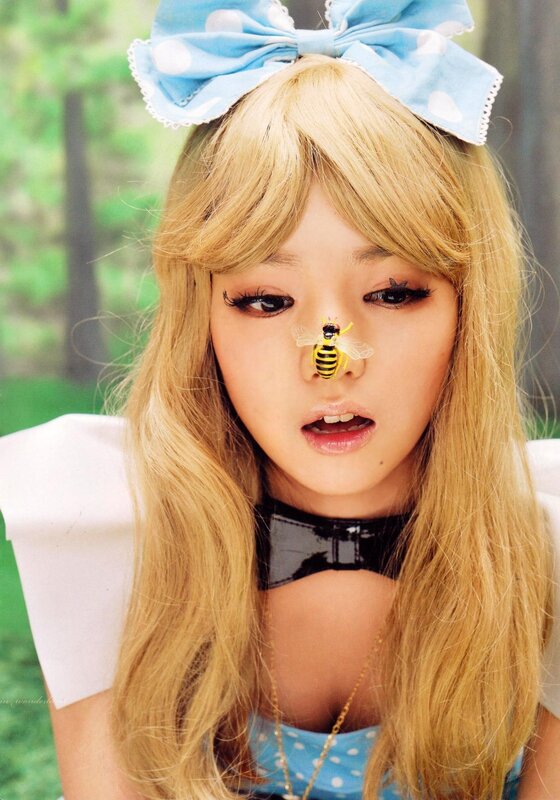 woman with bee on nose