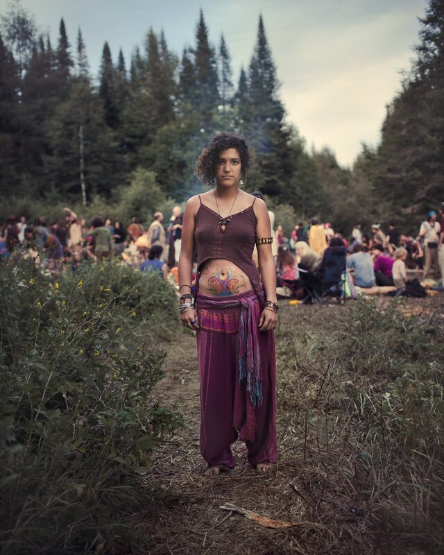 Woman with belly tattoo at festival