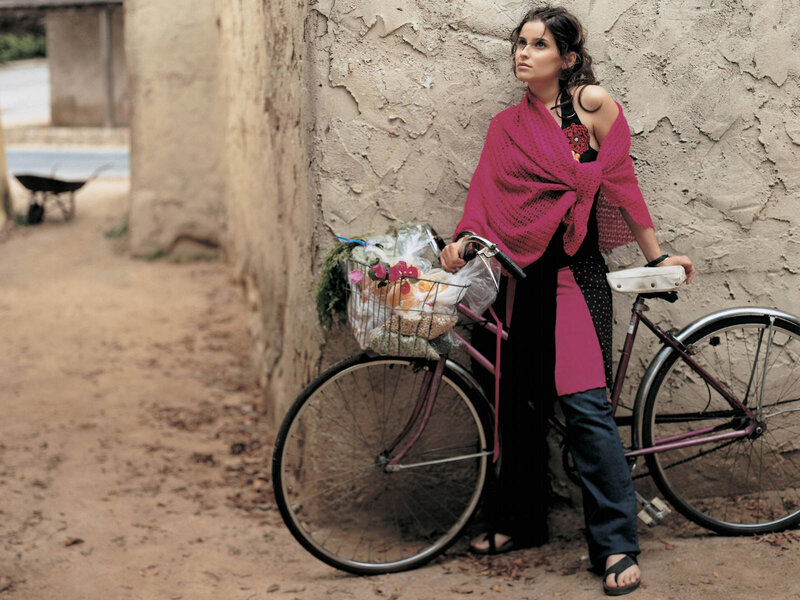 Woman with bicycle and basket