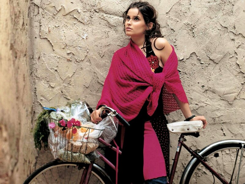 Woman with bicycle and basket
