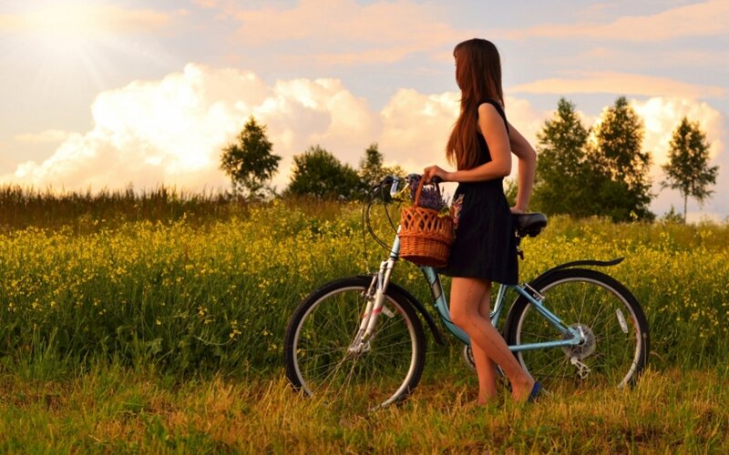 Woman with Bicycle — Green, Serene, Sunset