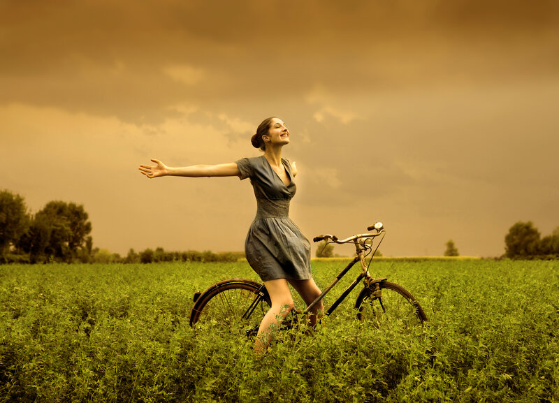 Woman with Bicycle in Field — Green