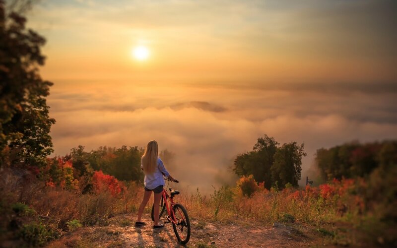 Woman with Bicycle — Orange