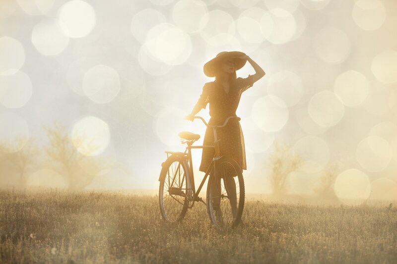 Woman with Bicycle — Yellow, Serene, Sunset