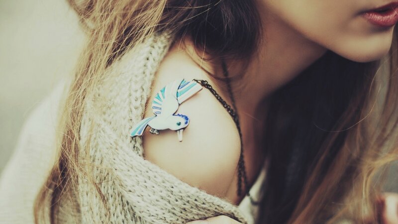 Woman with Bird Brooch — Beige