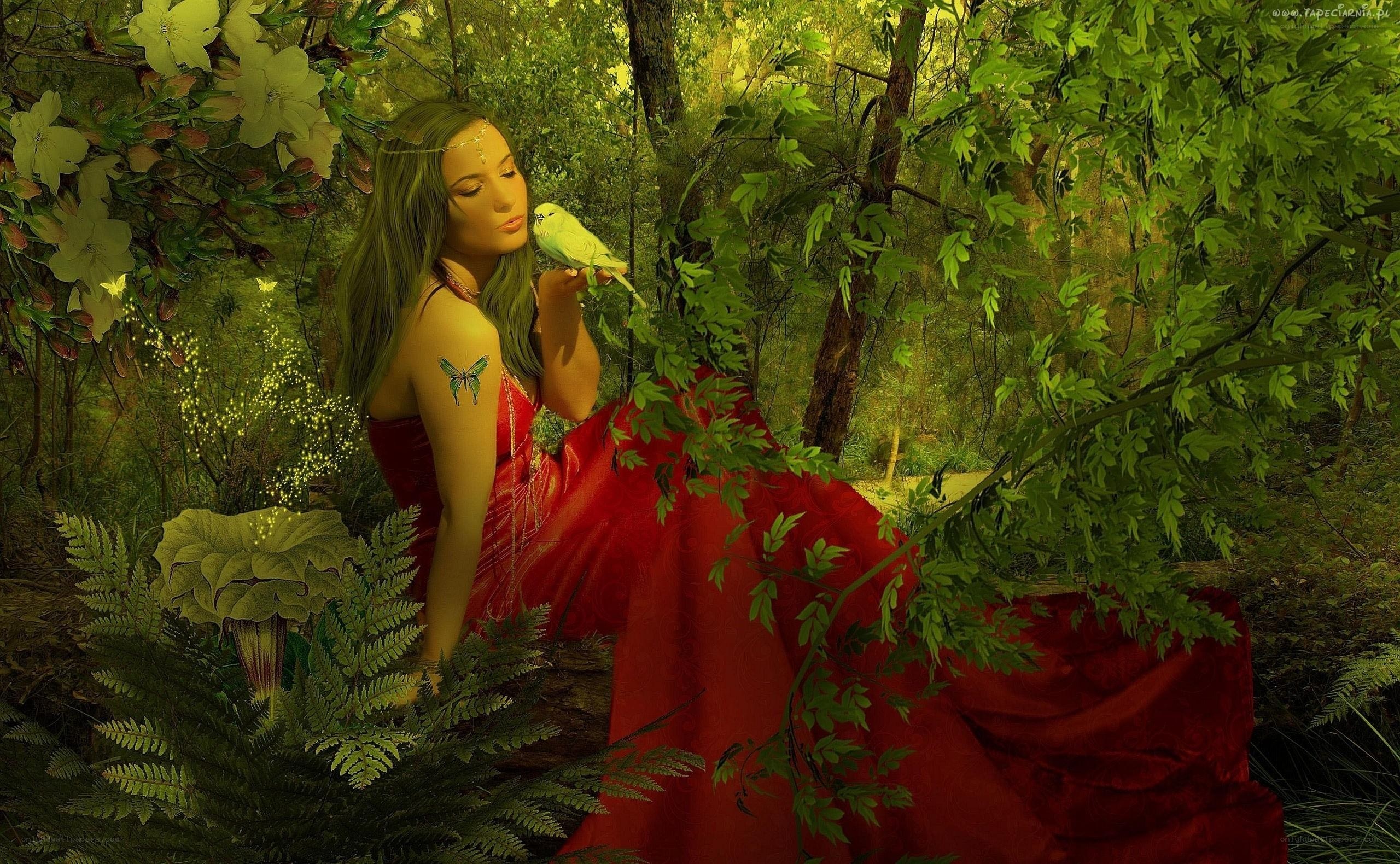 woman with bird in forest