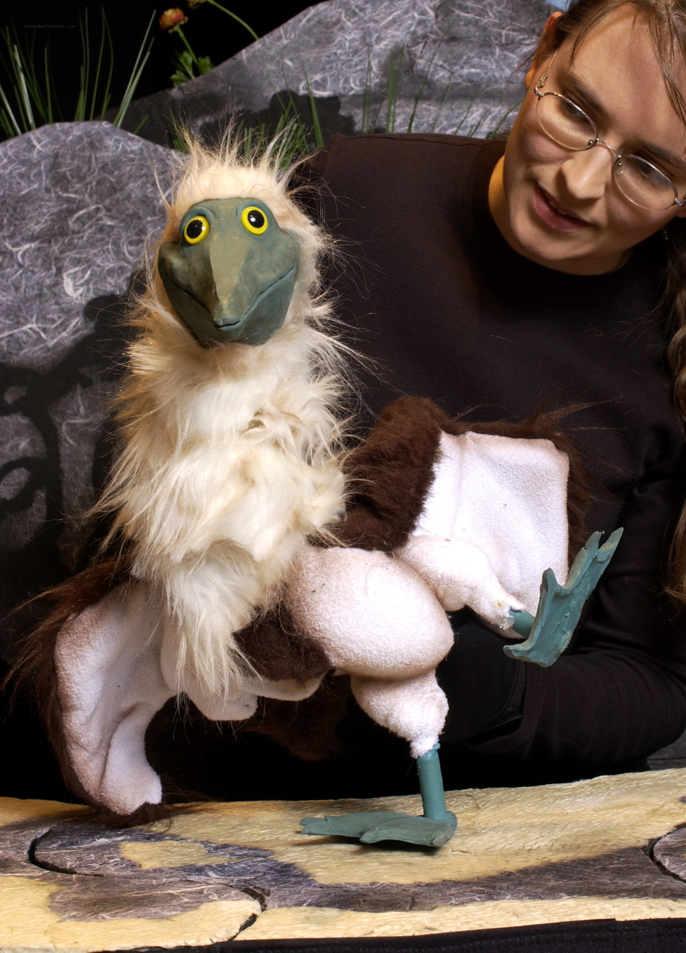 Woman with bird puppet