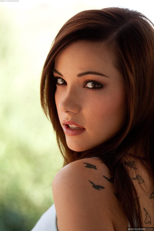 woman with bird tattoos