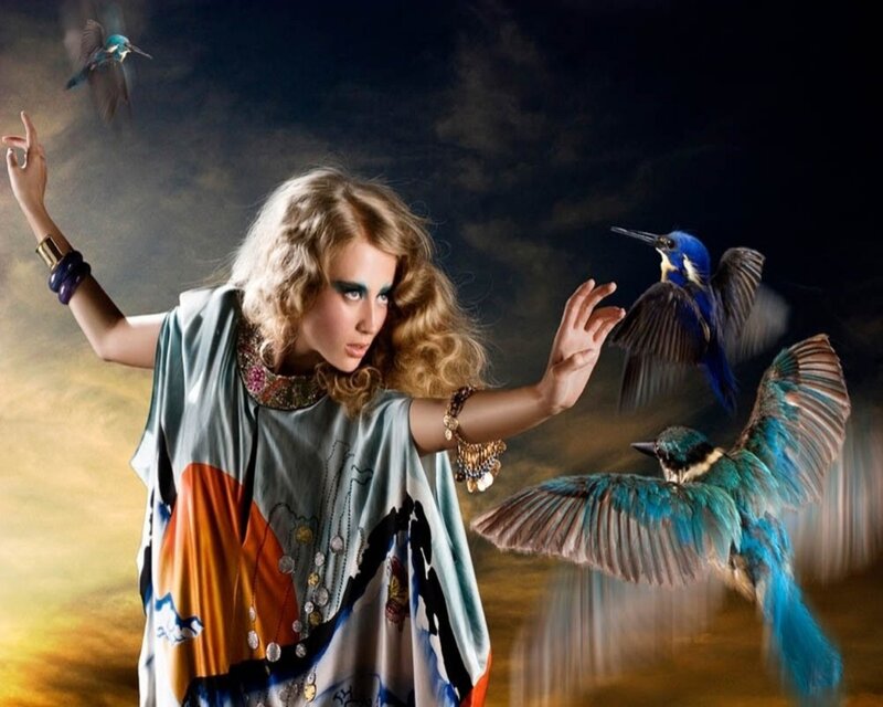 woman with birds in motion