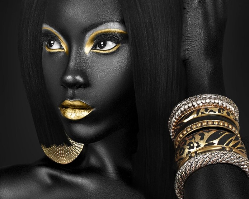 Woman with Black and Gold Makeup — Dramatic