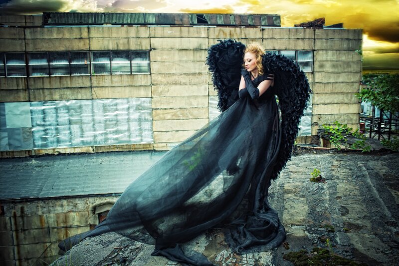 woman with black angel wings