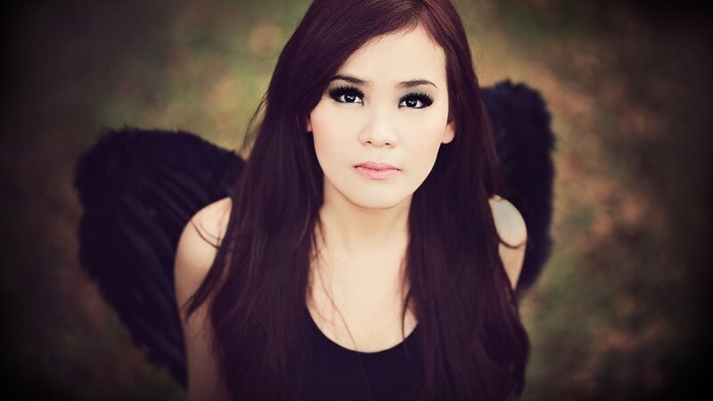 woman with black angel wings