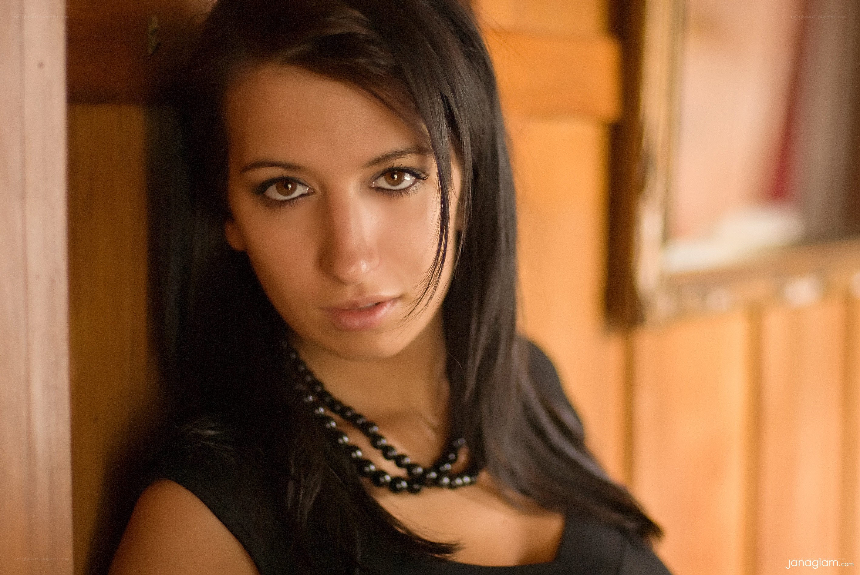 woman with black beads