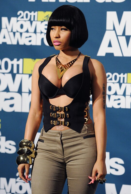 Woman with Black Bob Haircut — Confident, Photograph, Black Top, Gold Jewelry