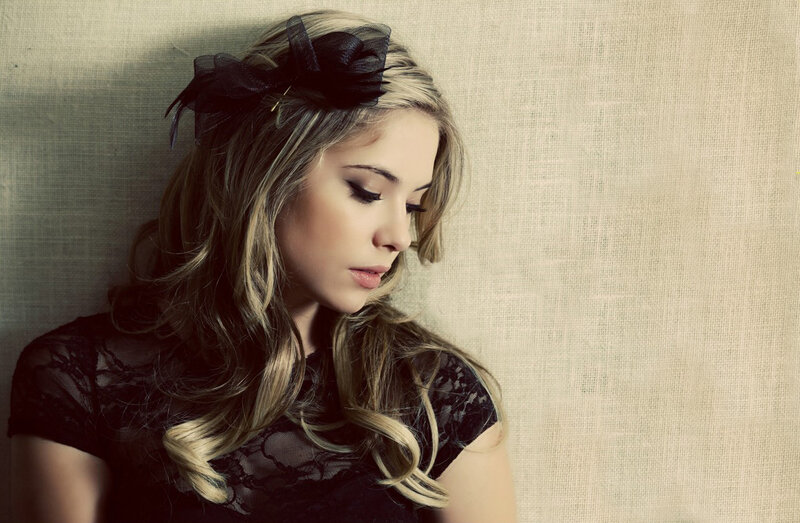 Woman with Black Bow — Contemplative