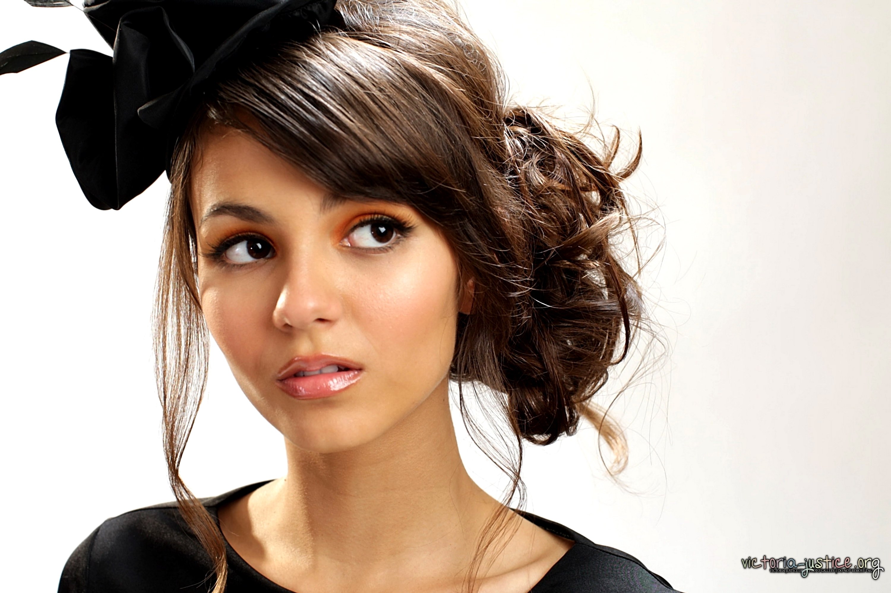 woman with black bow