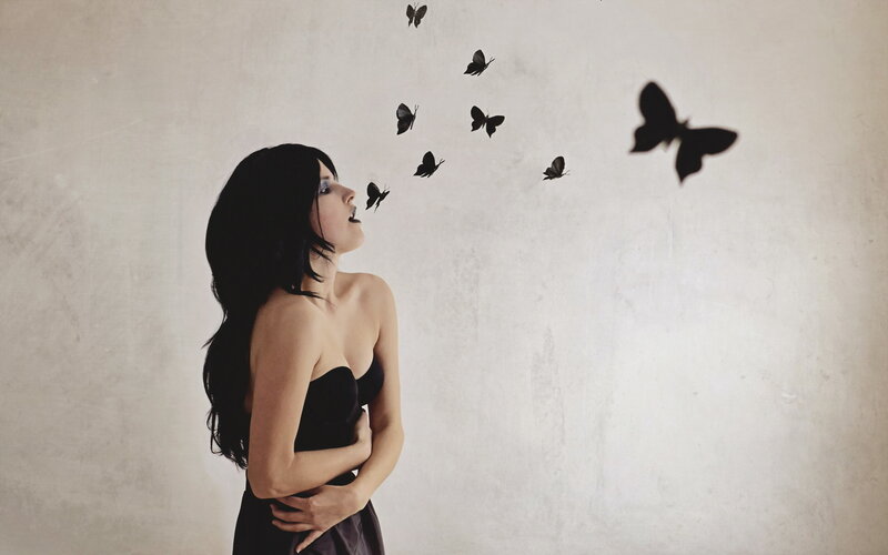 Woman with Black Butterflies