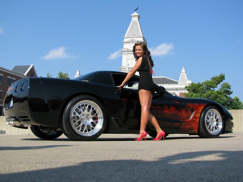 Woman with Black Car — Confident, Afternoon, Photograph, Building
