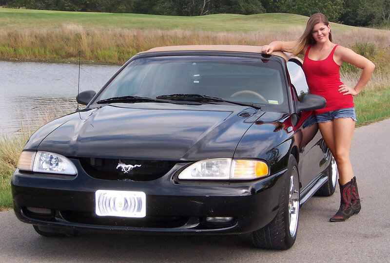 Woman with Black Car — Relaxed
