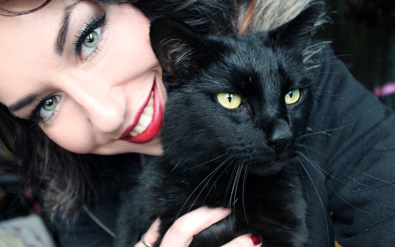woman with black cat