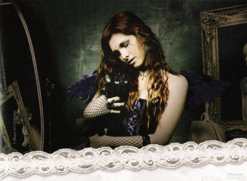 woman with black cat in gothic setting