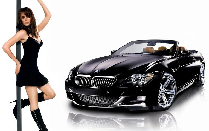woman with black convertible car