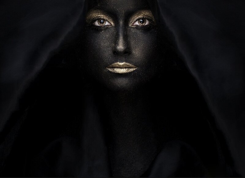 Woman with Black Face Paint