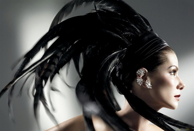 woman with black feather headdress