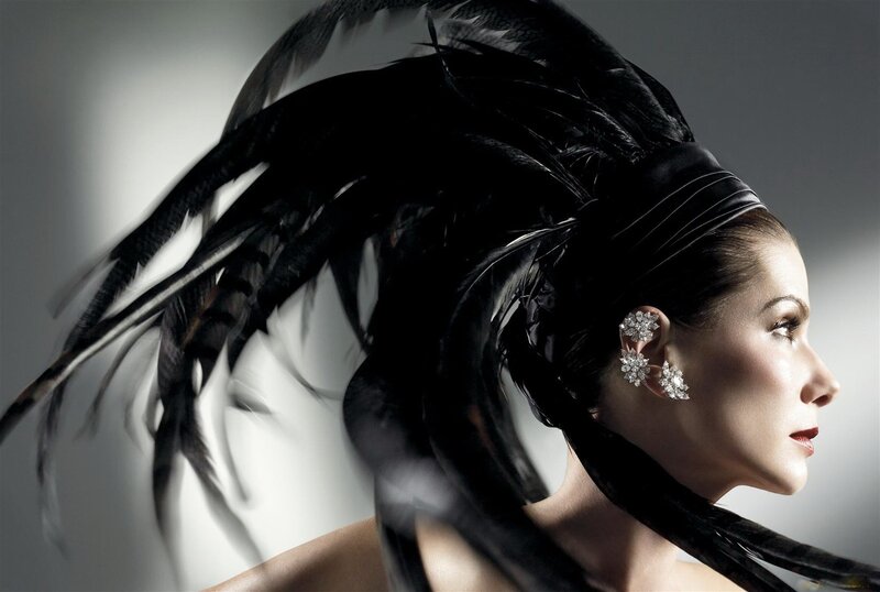 woman with black feather headdress