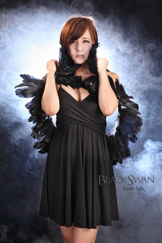 woman with black feather wings