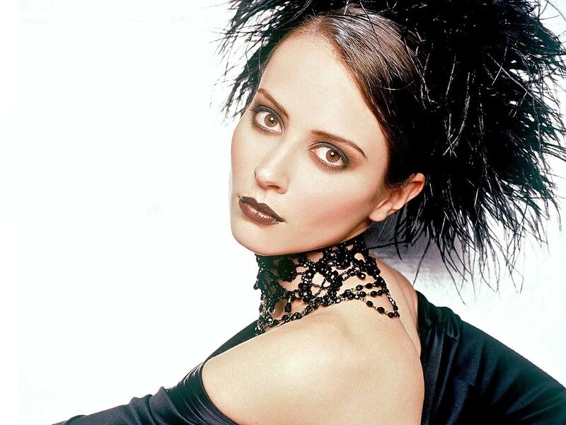 woman with black feathered hair