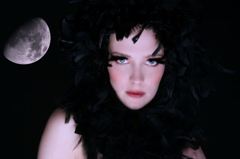 Woman with Black Feathers — Dramatic, Night