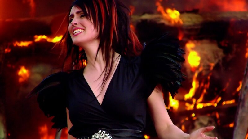 Woman with Black Feathers — Dramatic, Photograph, Fire