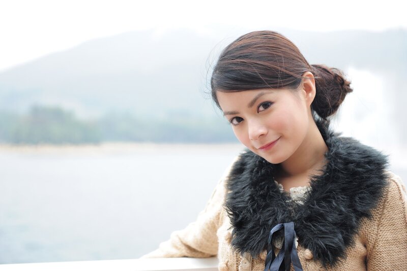 woman with black fur collar
