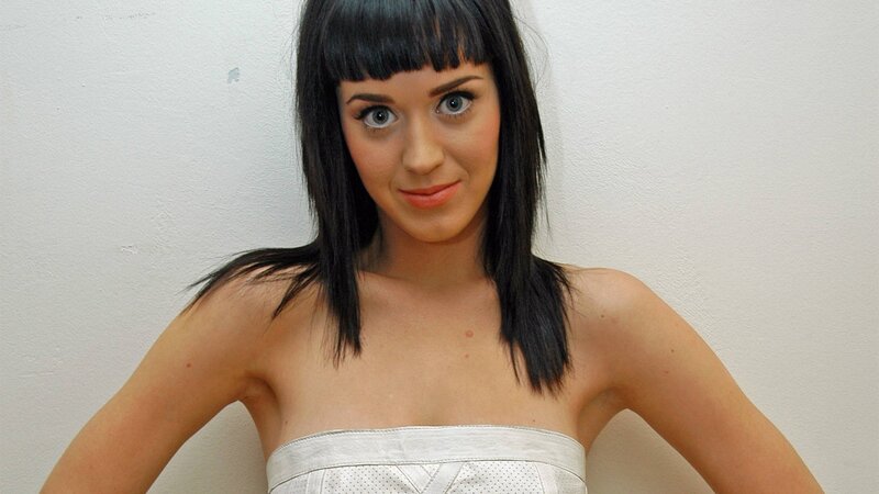 woman with black hair and bangs