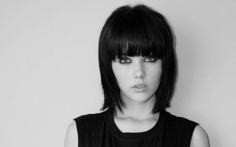 woman with black hair and bangs