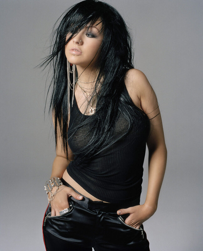 woman with black hair and piercings