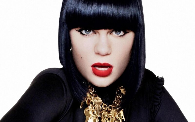 woman with black hair and red lipstick