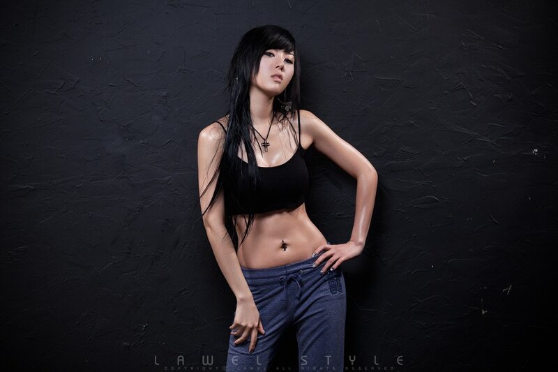 Woman with Black Hair — Dramatic, Photograph, Black Top, Jeans