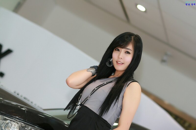 Woman with Black Hair — Neutral, Photograph, Car