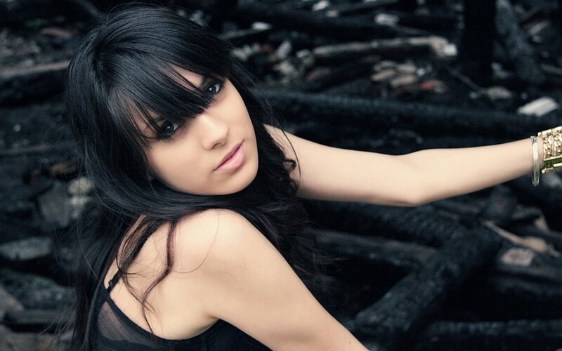 woman with black hair posing