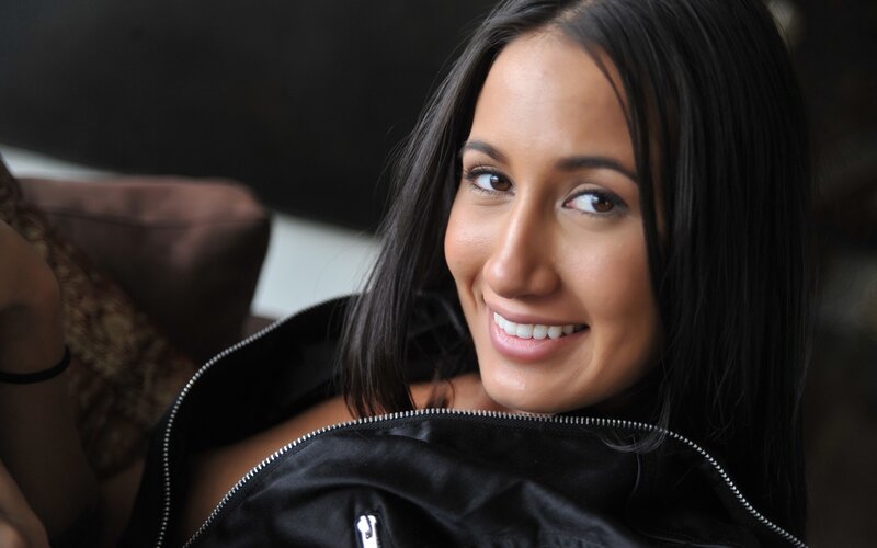 Woman with Black Hair — Relaxed, Photograph