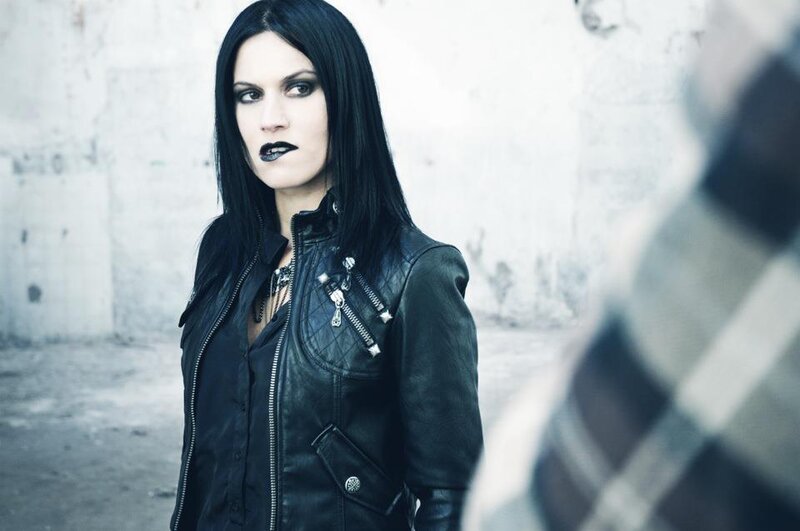 Woman with Black Hair — Serious, Photograph, Leather Jacket